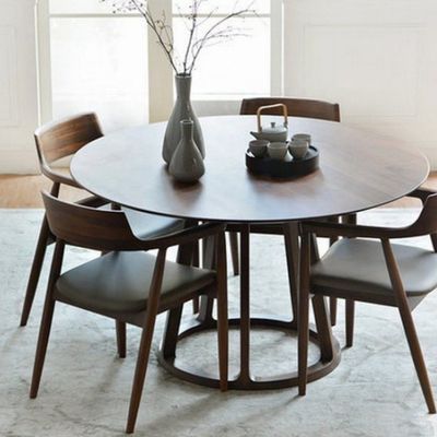 モダンダイニングルーム家具 ワルナッツ 固木枠 円形ダイニングテーブル ユニークなデザイン ノルディックデザイン
